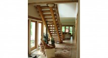 A naturally-finished timber frame staircase